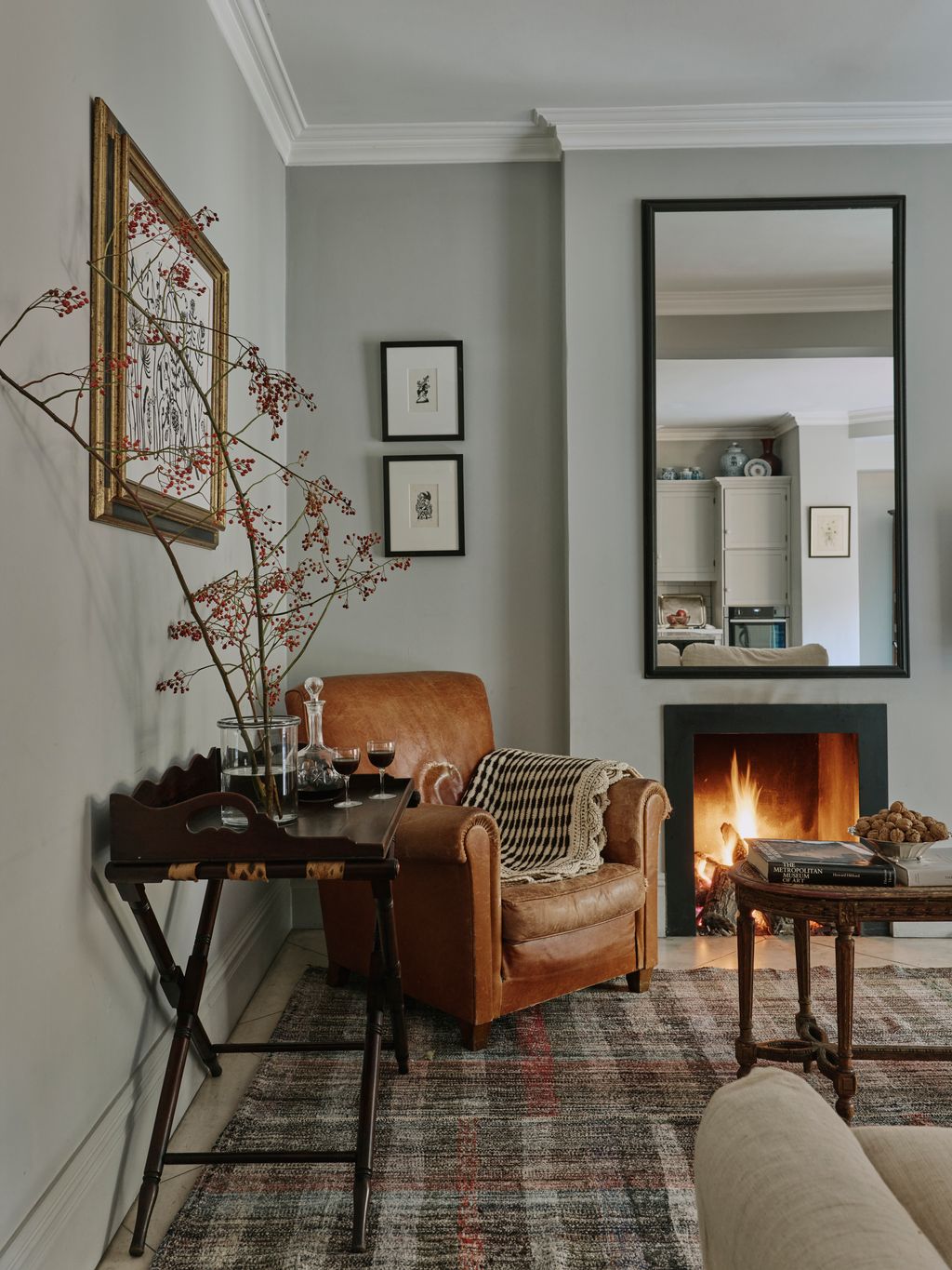 Image may contain Home Decor Furniture Table Fireplace Indoors Architecture Building Living Room and Room