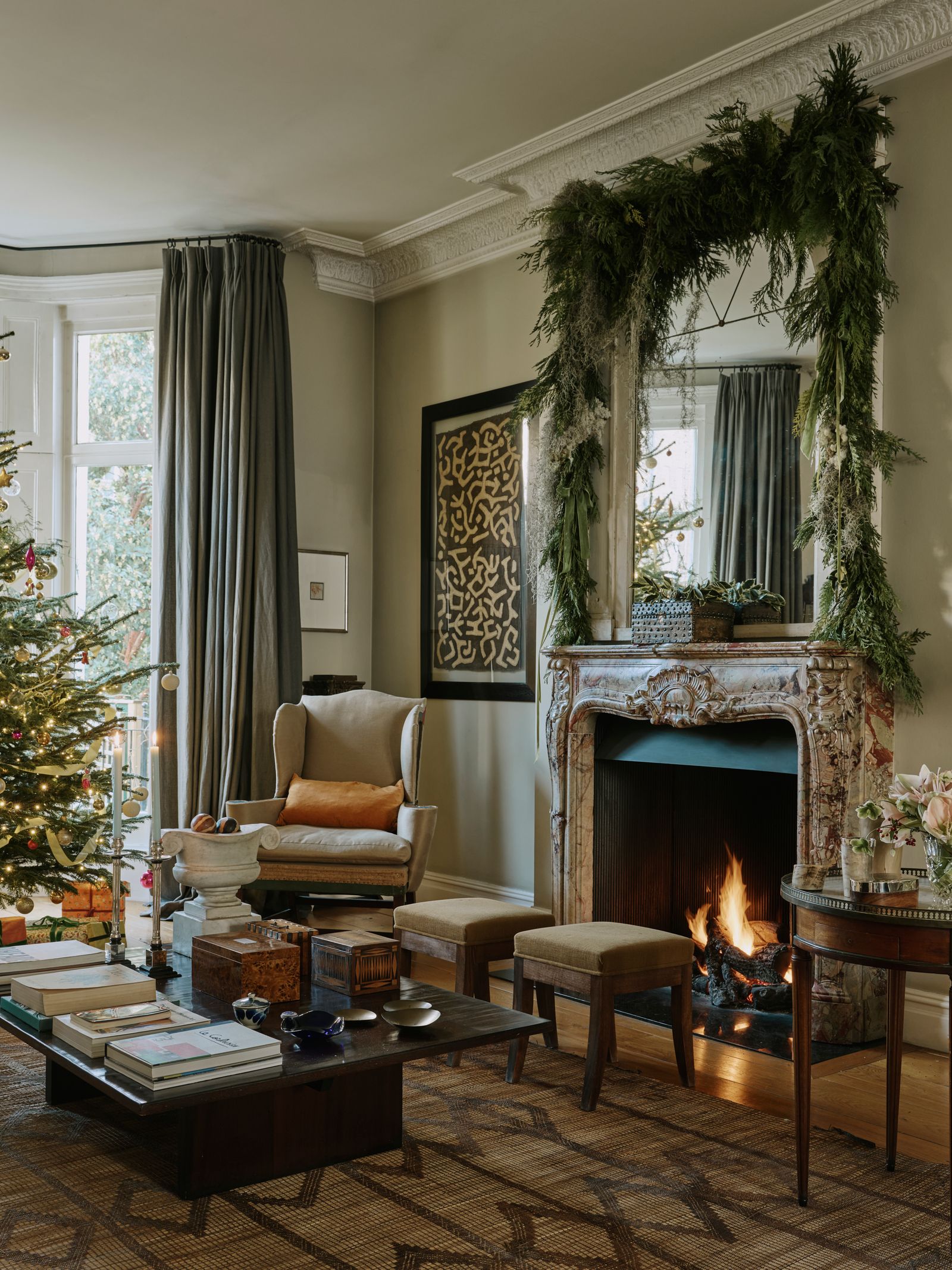 Image may contain Fireplace Indoors Hearth Home Decor Furniture Architecture Building Living Room Room and Table