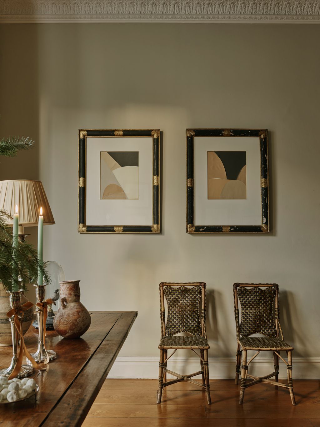 Image may contain Indoors Interior Design Candle Lamp Chair and Furniture