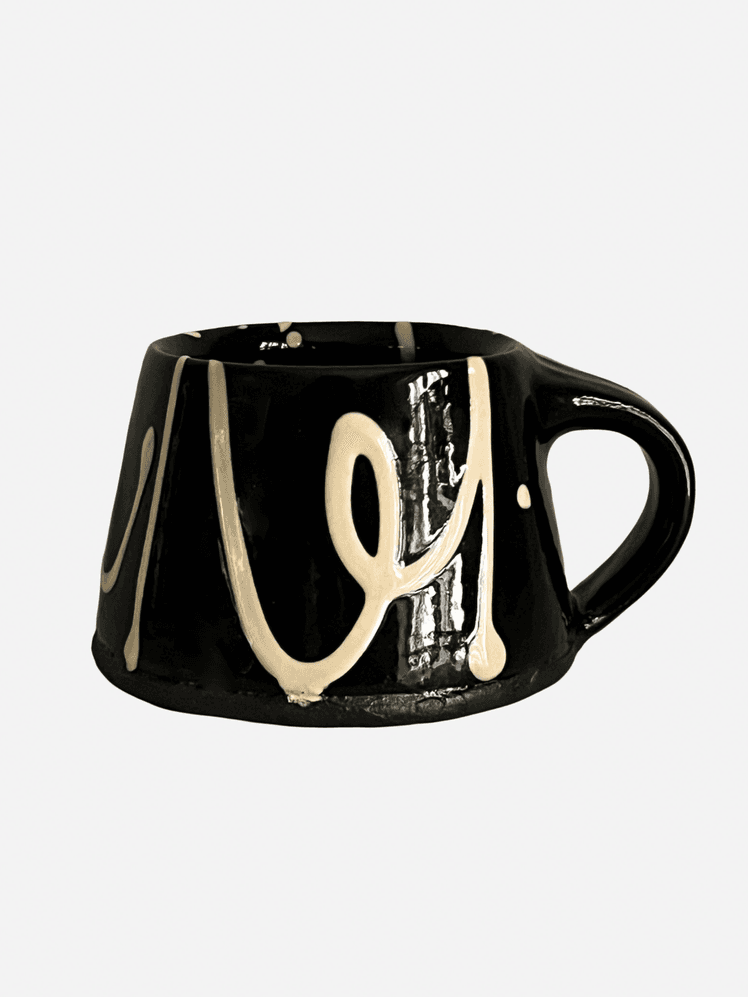 Image may contain Beverage Coffee Coffee Cup Cup and Pottery