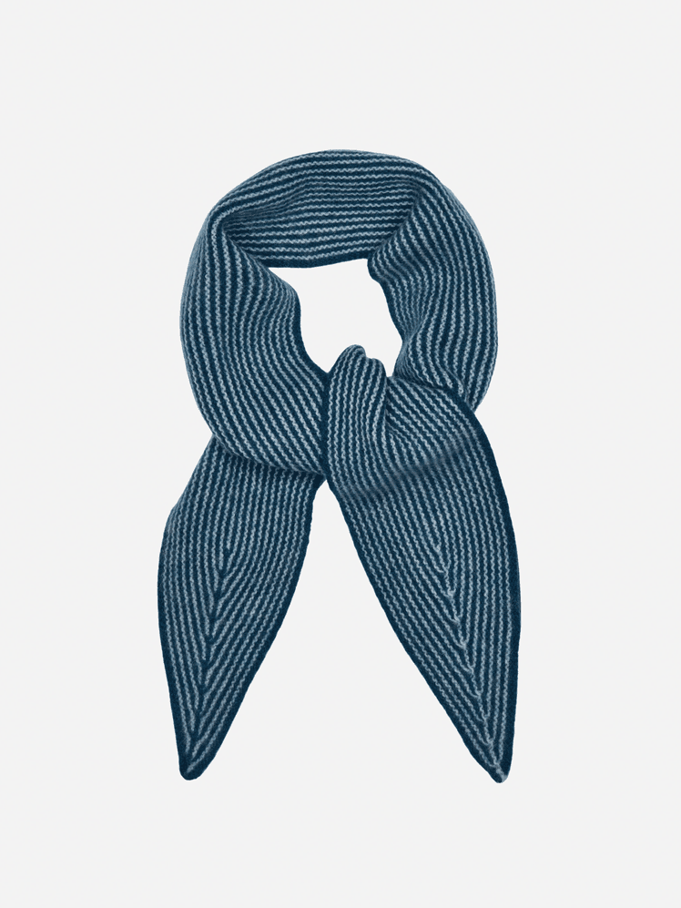 Image may contain Accessories Formal Wear Tie Clothing Scarf Knitwear and Sweater